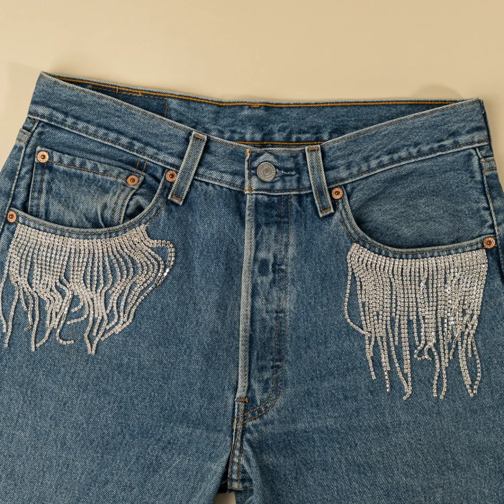 Jeans con applicazioni